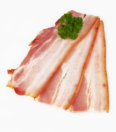  tasty sliced pork bacon on white background の写真素材