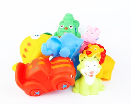 plastic bath toys on white の写真素材