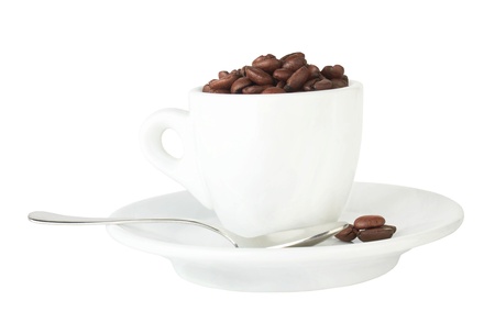 pour coffee grounds into the cup is isolated on a white backgroundの写真素材