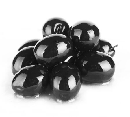 black olives on white backgroundの写真素材