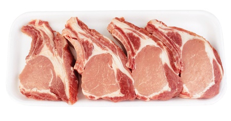 Pork meat with bone in box isolated on white background. の写真素材