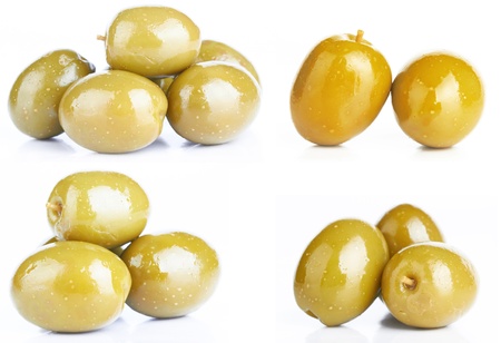 green olives on a white background の写真素材