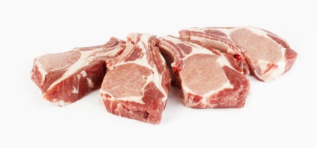 meat raw pork cutlet on a white background の写真素材