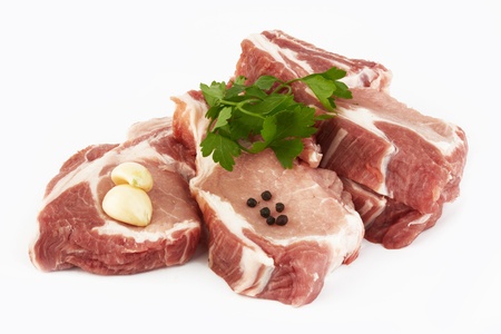 meat raw pork cutlet on a white background の写真素材