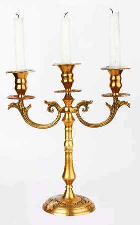 Old-fashioned baroque elegant candlestick isolated on white background の写真素材