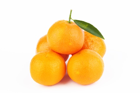 Ripe tangerines on white background の写真素材