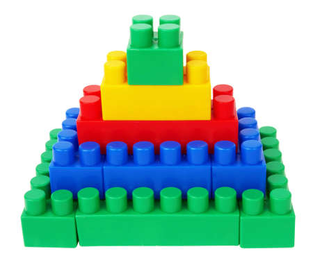 plastic building blocks pyramid on a white background の写真素材