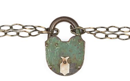 Padlock and chain on a whiteの写真素材