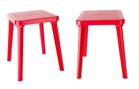 Red plastic chair isolated on white background の写真素材