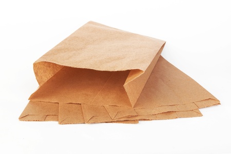 Brown paper bags on white background の写真素材