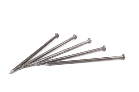 metal nails on a white backgroundの写真素材