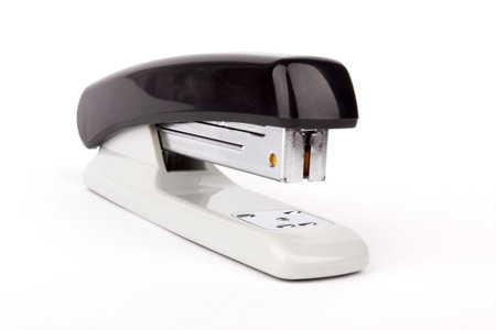 Black professional stapler on white background