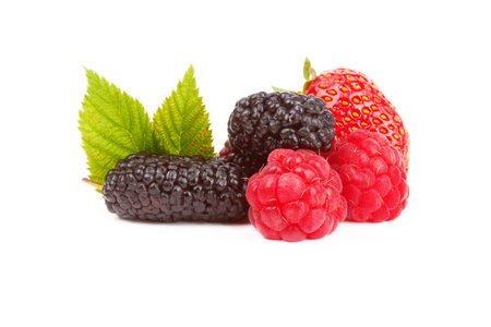 Strawberries, raspberries and mulberry on a white background 