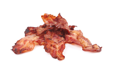 cooked slices of bacon isolated on white backgroundの写真素材
