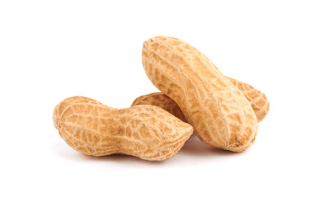 Fresh peanuts with shells isolated on white background