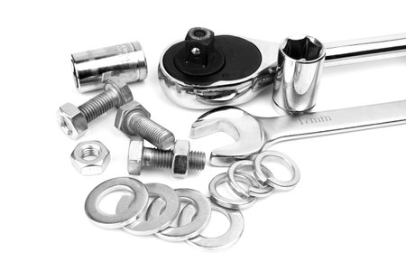 screw with spanners isolated on the white background 