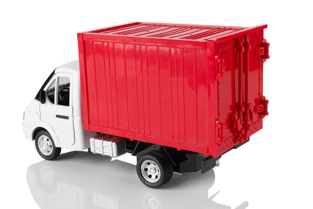 Toy red truck isolated on a white backgroundの写真素材
