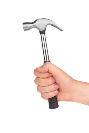 hand holding a steel hammer isolated on white backgroundの写真素材