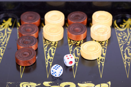 Wooden handmade backgammon board and two dices