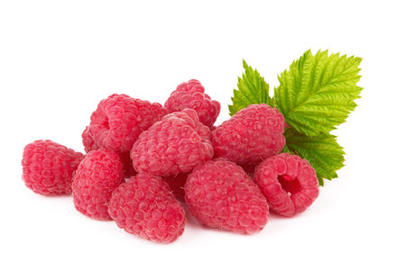 Ripe raspberry with leaf isolated on white