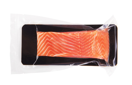 Fillet of salmon vacuum packed isolated on white backgroundの写真素材