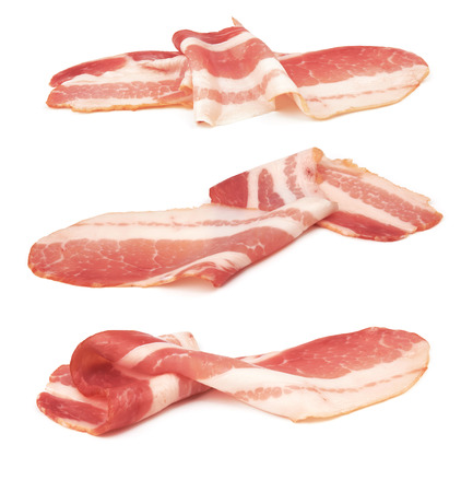 Fresh sliced bacon on white backgroundの写真素材