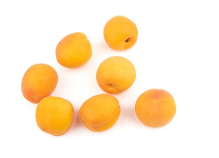 Apricots heap isolated on a white backgroundの写真素材