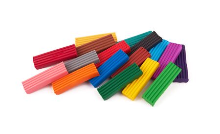 colored plasticine on isolated white backgroundの写真素材