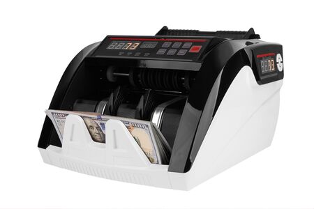 Electronic money counter withhundred dollars banknotes on whiteの写真素材