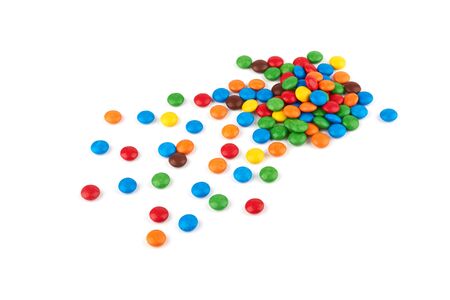colorful chocolate buttons isolated on a white backgroundの写真素材