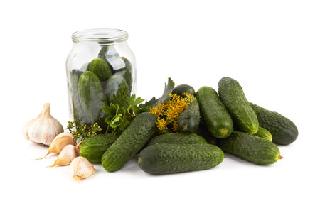 Cucumbers preparation for canning on a white backgroundの写真素材