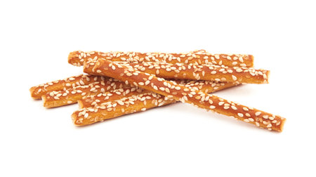 Pretzel sticks coated sesame isolated on white backgroundの写真素材
