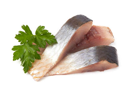 Slices of herring fish isolated on a white backgroundの写真素材