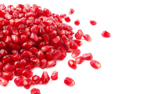 Pomegranate seeds isolated on a white backgroundの写真素材