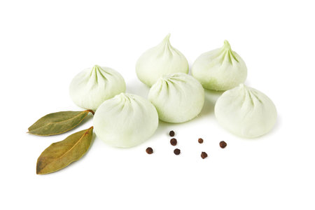 Frozen green khinkali isolated on white backgroundの写真素材