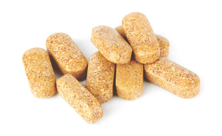 Pills vitamins isolated on a white backgroundの写真素材