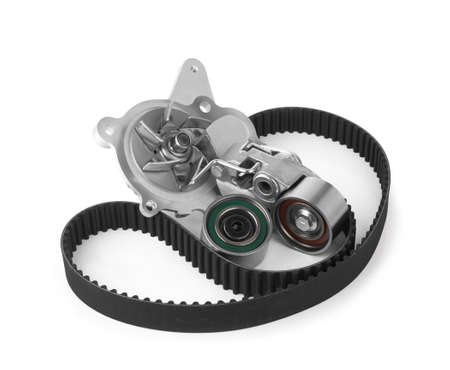 Timing belt with pump and half-bolts on a white backgroundの写真素材