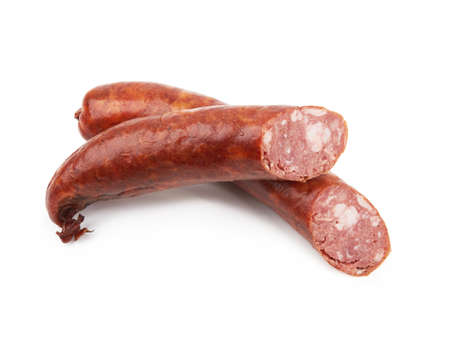 Boiled and smoked sausage on a white background. Farm smoked sausageの写真素材