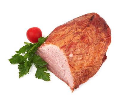 A cut piece of smoked pork isolated on white backgroundの写真素材