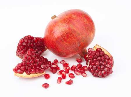 Sliced pomegranate path isolated on a white backgroundの写真素材