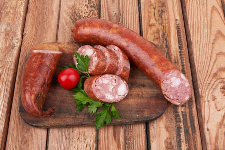 Red beans isolated on a wooden backgroundの写真素材