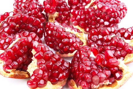 Sliced pomegranate path on a white backgroundの写真素材