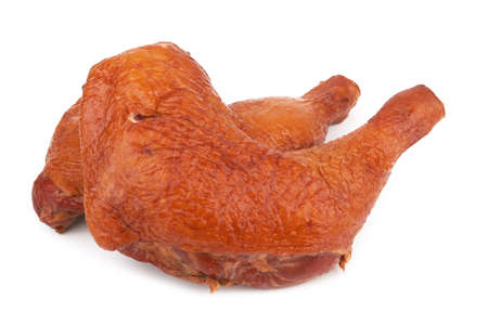 Smoked chicken thighs isolated on a white backgroundの写真素材