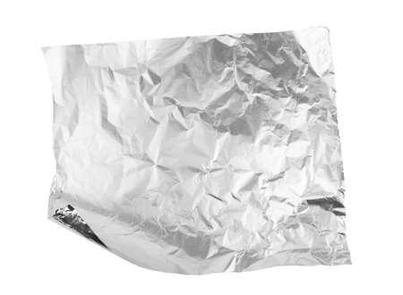 A piece of an aluminum foil on white backgroundの写真素材