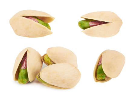Pistachios isolated on white a backgroundの写真素材