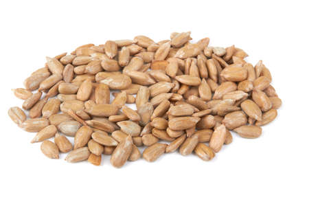 Peeled sunflower seeds isolated on white backgroundの写真素材
