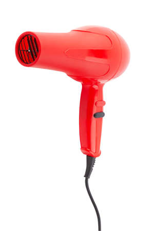 Red hair dryer isolated on a white backgroundの写真素材