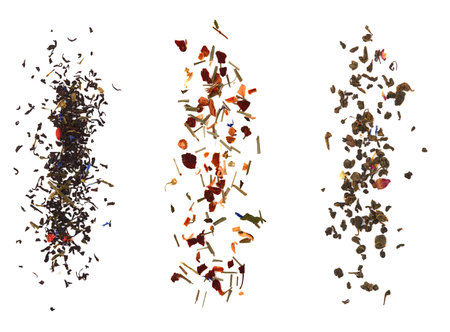 Falling tea dried leaves isolated on white background.の写真素材
