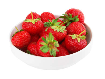 Fresh red strawberries in bowl isolated on white backgroundの写真素材