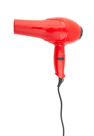 Red hair dryer isolated on a white backgroundの写真素材